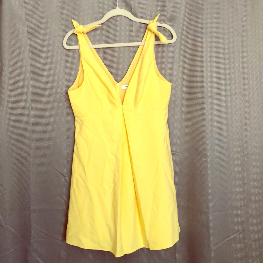 Likely size 10 yellow dress